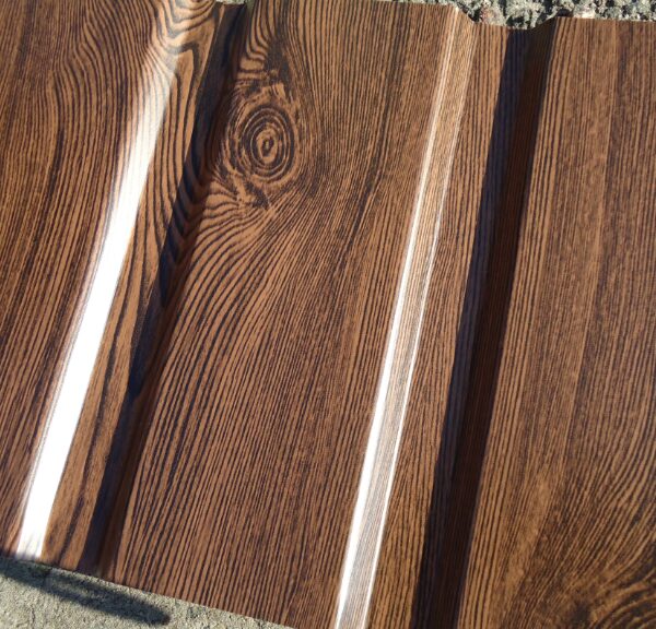 Фасад из профнастила с 10 под дерево орех 1170 мм ширина листа